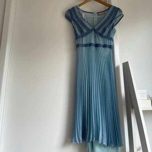 Review Dresses & Skirts - Beautiful REVIEW pleated dress with lace detail.
